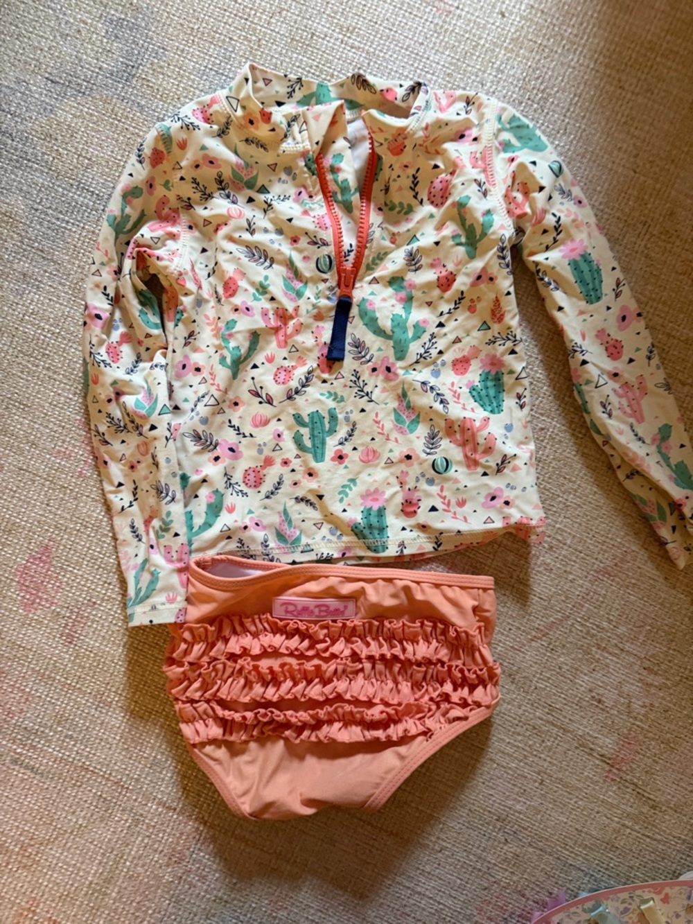 Ruffle Butts Cream Cactus Print Rashguard with Coral Ruffle Swim Bottoms